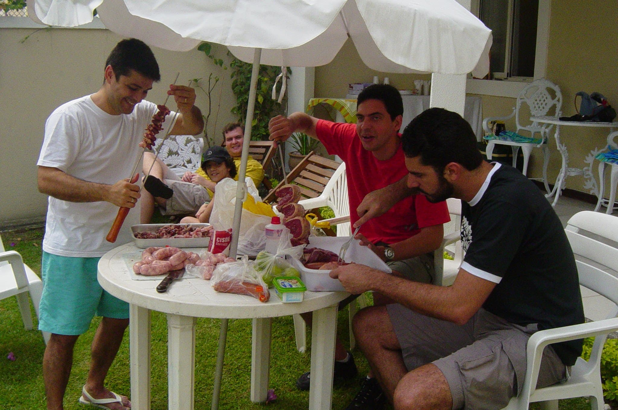 Preparing the espetos — a Brazilian tradition